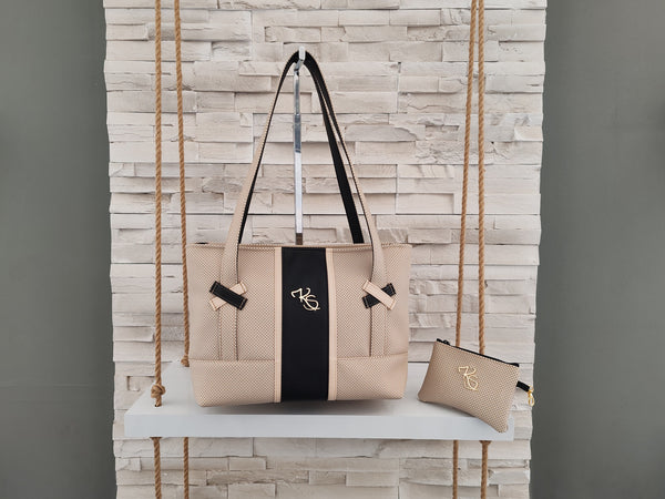 Sac à main " Popine " à l'épaule beige perforé et noir