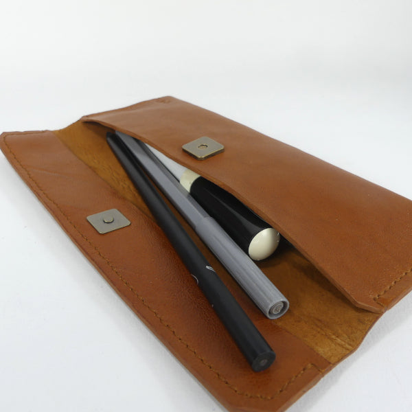 Trousse en cuir marron cognac